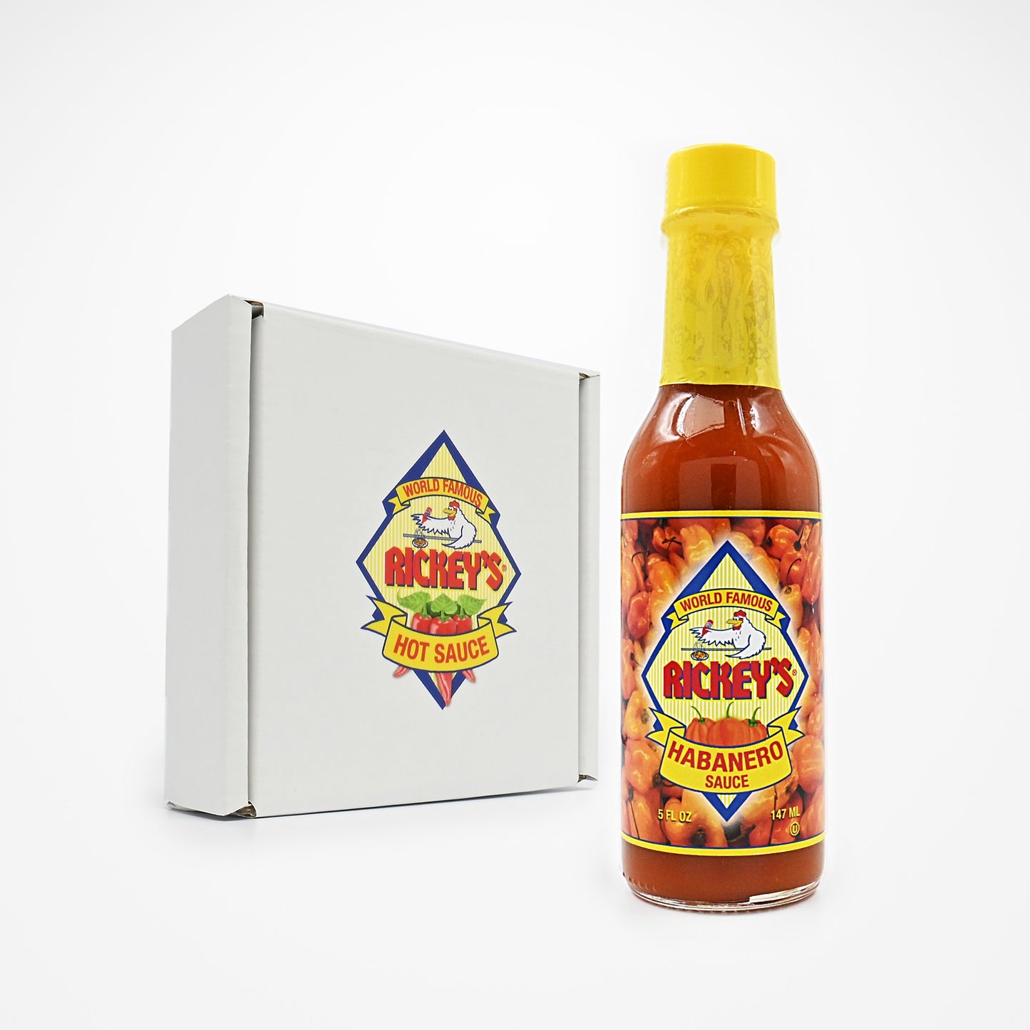 Bottle of Rickey's Habanero Sauce and a box for three pack