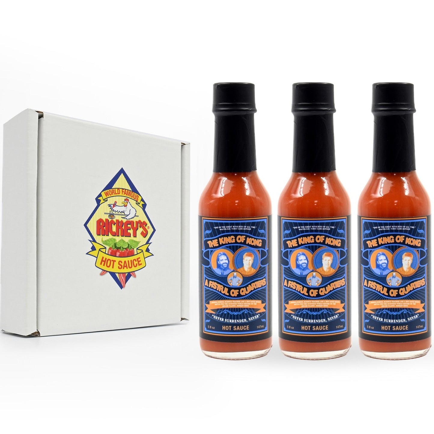 The King Of Kong Hot Sauce in front of three pack box